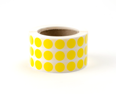 Gule små farvede prikker på rulle